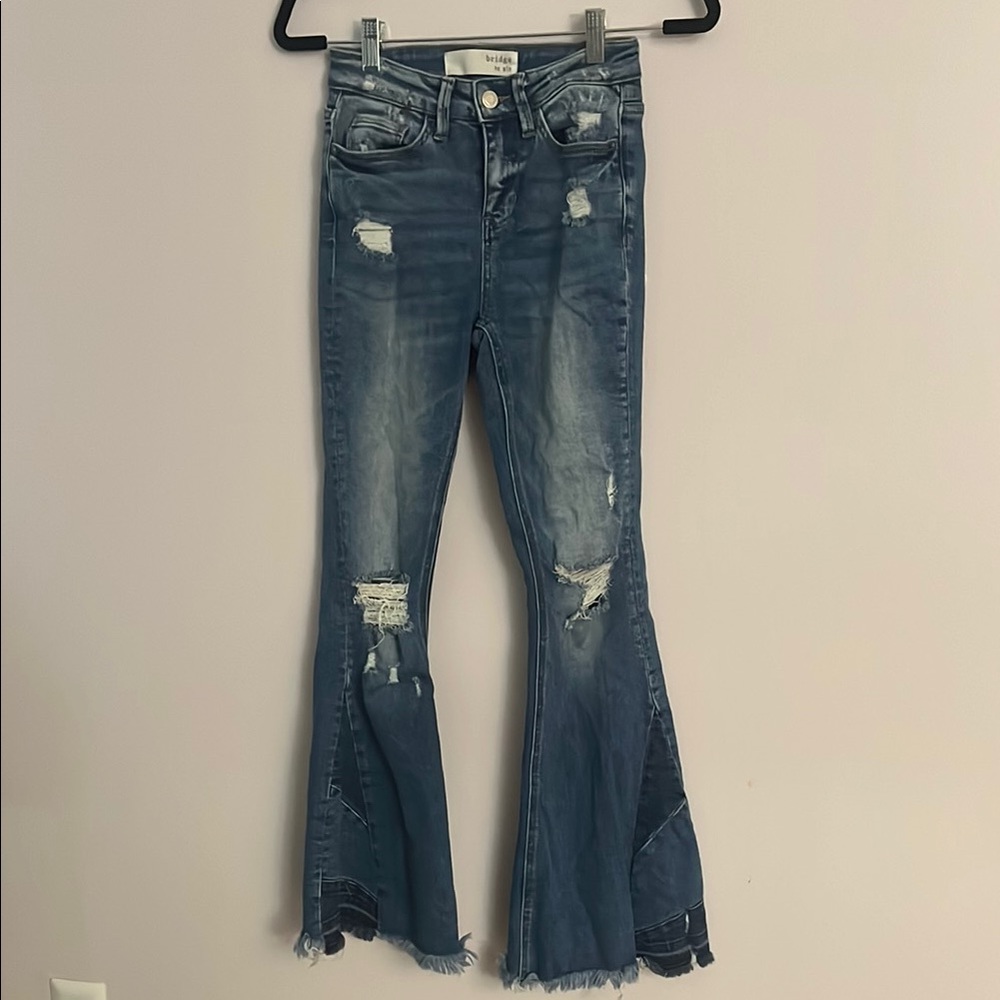Flare Blue Jeans with Distressed Hem